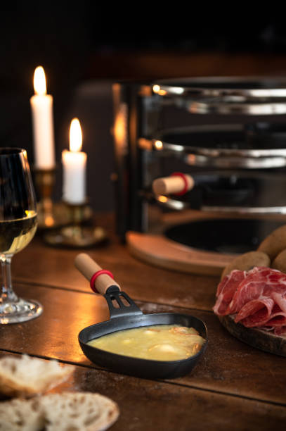 français raclette - fondue swiss culture winter cheese photos et images de collection