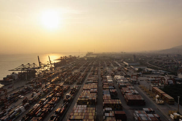 istock Commercial terminal with containers at sunset 1387430024
