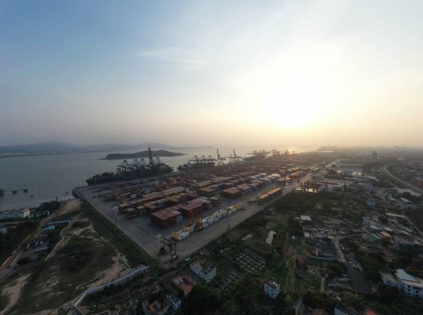 istock Commercial terminal with containers at sunset 1387430567