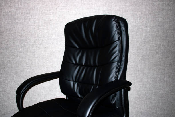 istock Black leather office chair 1387430649
