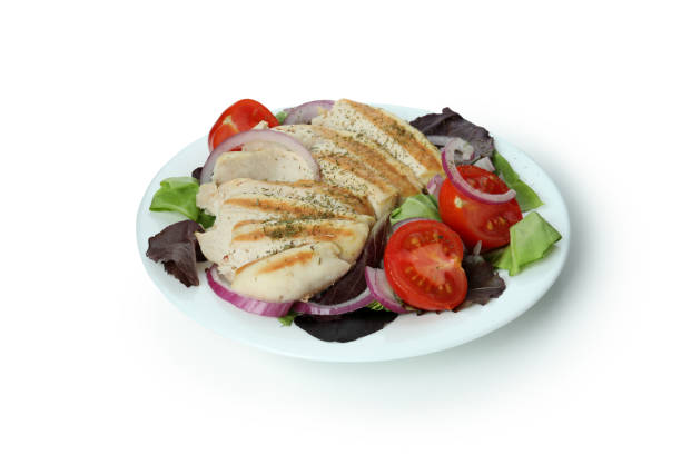 Salad with grilled chicken isolated on white background