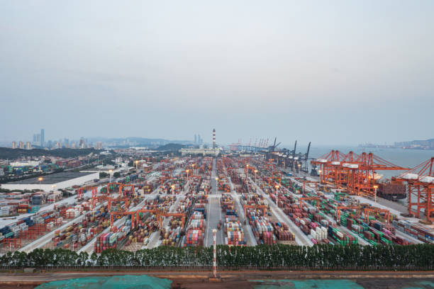istock Commercial terminal with containers at sunset 1387431597