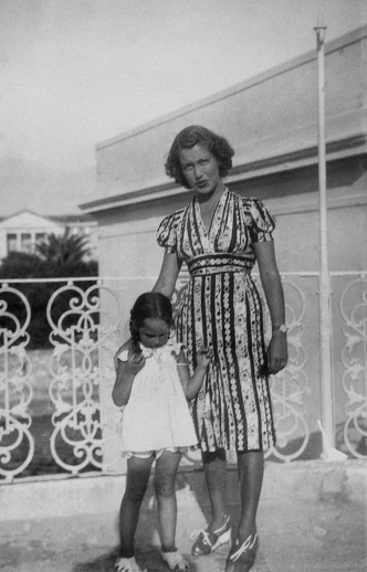 Mother with her daughter on the balcony in 1952.