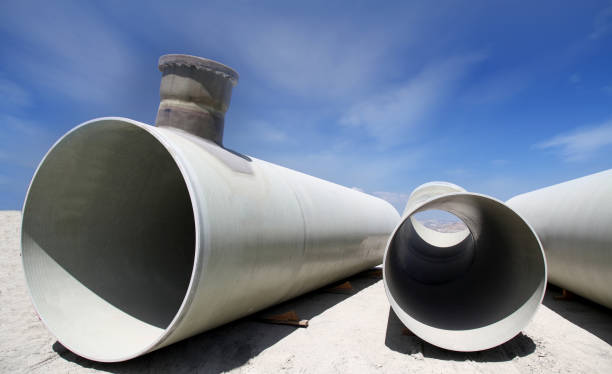 istock Stack of new metal pipes. Industrial material. 1387436087