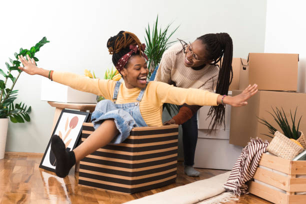 istock Two African American girls having fun while moving in 1387436910