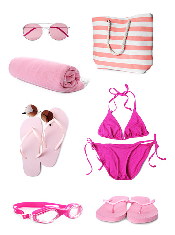 Set with beach accessories on white background