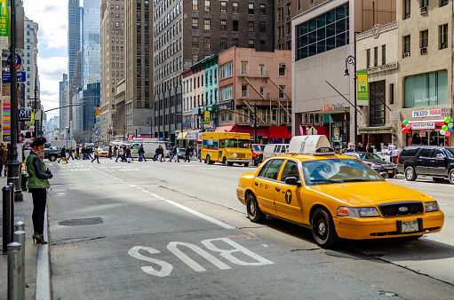 New York, USA - February 19, 2023: Traffic on the street in Manhattan, New York, United States