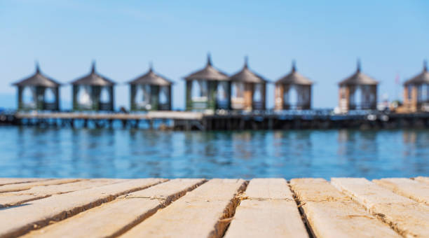 istock Empty wooden deck on the background of the bungalow. 1387450063