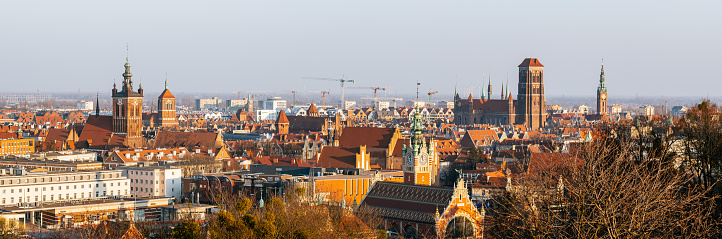 Panorama of Gdansk in a sunny day. View from above. St. Catherine's Church and St. Mary's Church are on the background.
