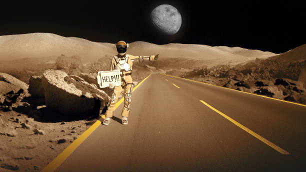istock Astronaut hitchhiking in space holding 'help!!!' sign. Going home from Mars 1387453683
