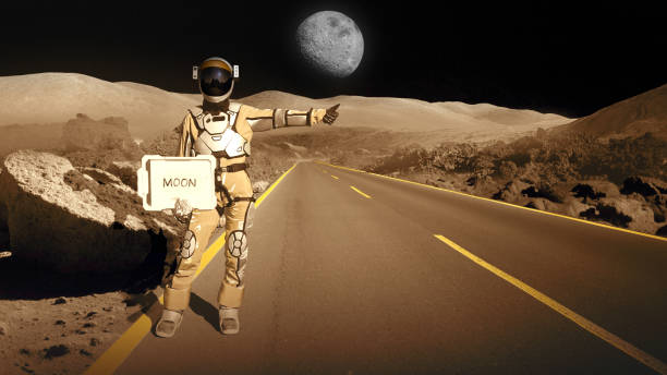 istock Astronaut hitchhiking in space holding 'moon' sign. Going home 1387453787