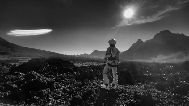 istock Astronaut exploring a new planet. Searching for alien life 1387453815