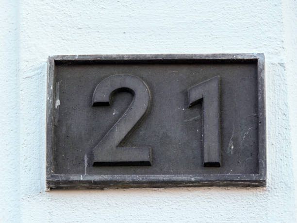 istock Metal house number on a wall 1387456108