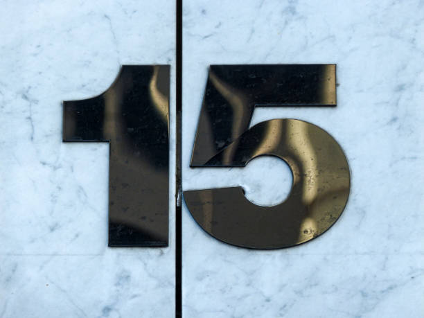 istock Metal house number on a wall 1387456117