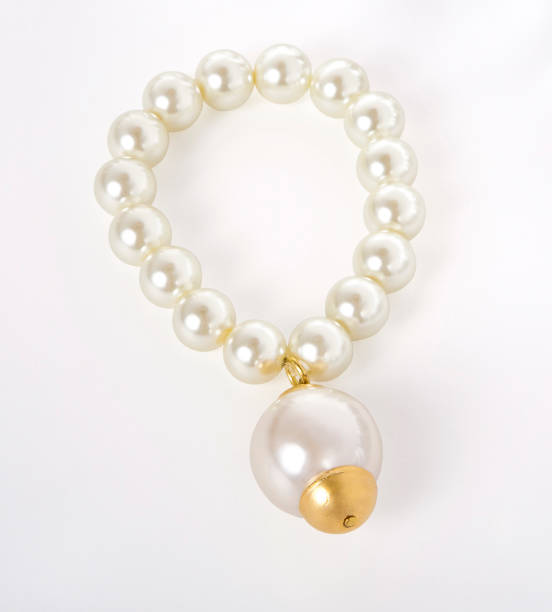 istock Pearl bracelet on white background 1387456585