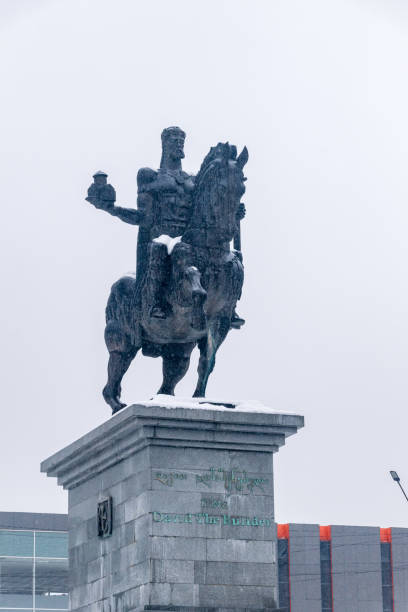 Moscow, Russia. April 14, 2019 Four Seasons Fountain against the backdrop of the Central Exhibition Hall. Text translation: Central Exhibition Hall