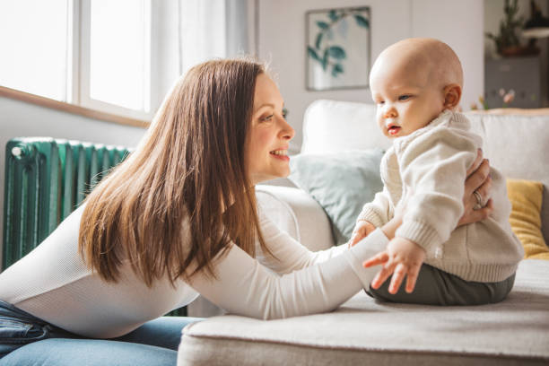 istock Young family at home 1387459537