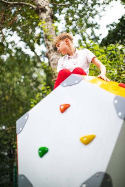 istock Preschool boys enjoying at playground 1387459668