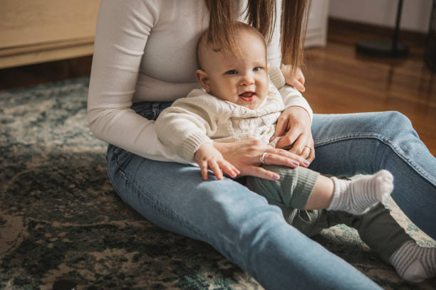 istock Young family at home 1387460992