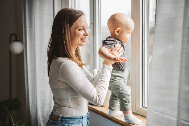 istock Young family at home 1387461136