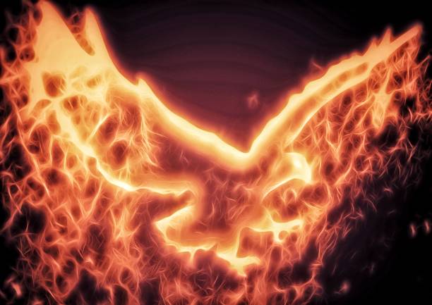 istock Illustration of a phoenix flapping in the night sky 1387469052