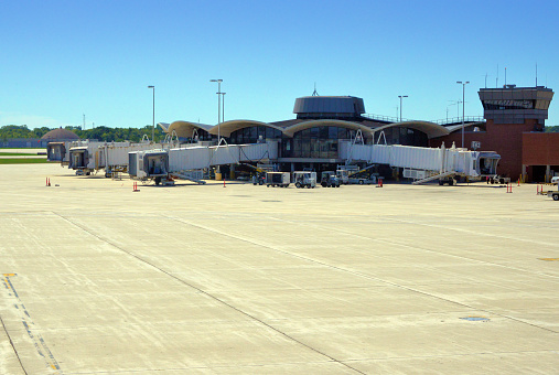 Milwaukee, Wisconsin, USA: General Mitchell International Airport - Concourse E with passenger boarding bridges and apron - architecture by Leigh Fisher and Associates.