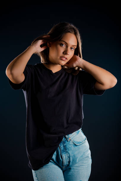 istock Beautiful modern girl posing in studio 1387474222