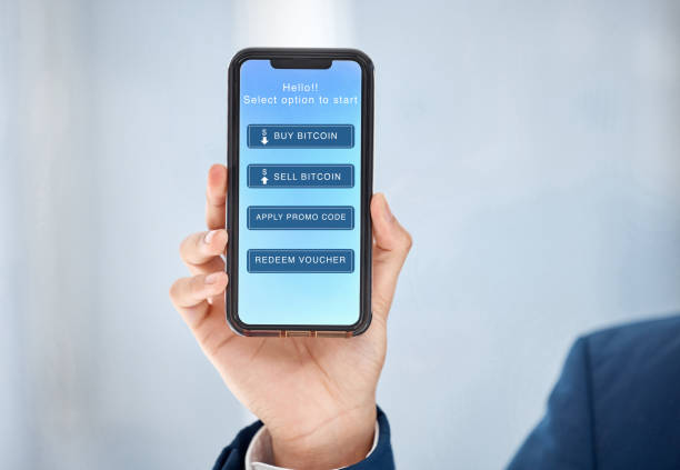 istock Shot of an unrecognizable businessperson using a phone at work 1387474801