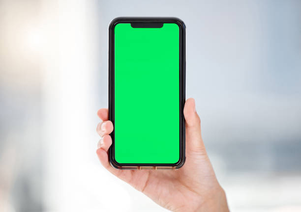 istock Shot of an unrecognizable businessperson using a phone at work 1387474813