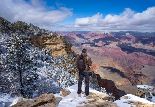 istock Man on winter vacation in the Arizona mountains. 1387475037