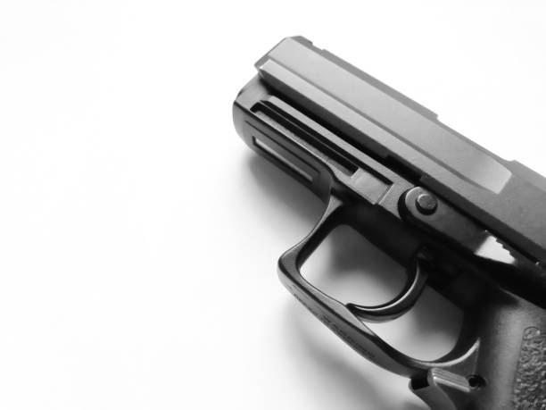 istock Modern semi-automatic pistol. For stalker games, training. Traumatic weapons. The gun is black on a white background. 1387477752