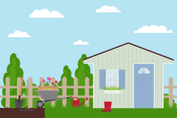 istock Spring landscape in the garden with garden house and tools 1387483470