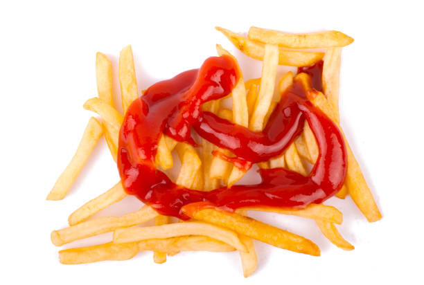 french fries potato and ketchup isolated on white background with clipping path.