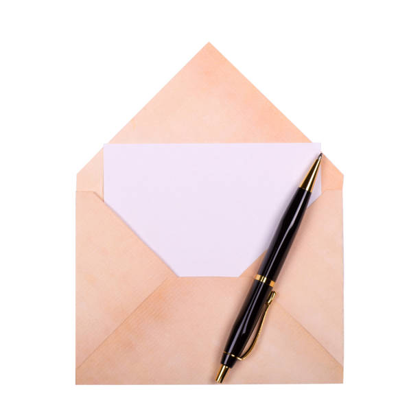 Old envelope made from old pepper with pen and blank isolated on white background.