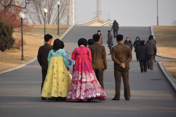 A North Korean wedding party pay their respects at the Mansudae Grand Monument in Pyongyang.