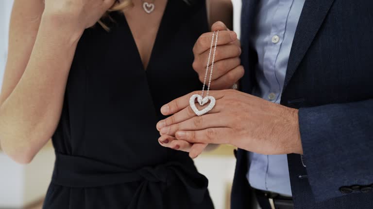 Beautiful couple in jewelry store