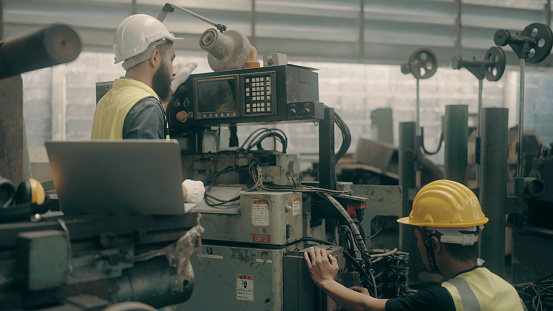 Workman Solving Problem Factory Workers Try To Solve Problems With Machines Stock Photo ...