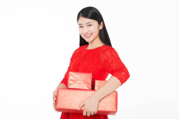 istock girl and her new year's gift 1387493595