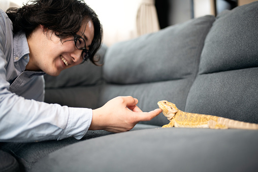 Mid-adult man loving pets