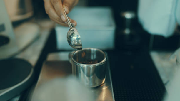 istock Employees make coffee in the shop for customers. 1387496382