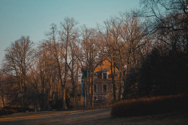 istock Old house in the spring park in Goluchow, Poland. 1387497535