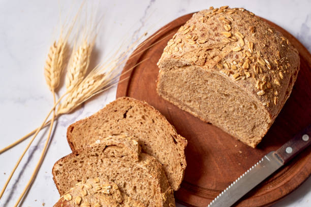 istock Fresh sourdough rye bread made in slices. 1387498641
