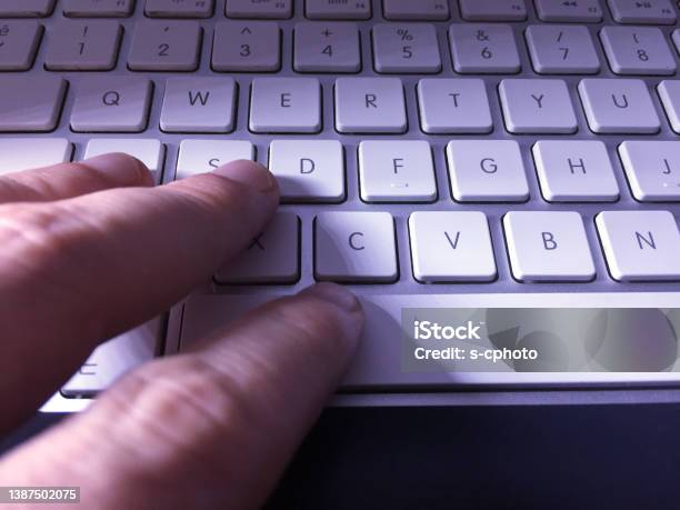 Using Computer Finger Pushing Computer Keyboard Push Button In The Dar ...