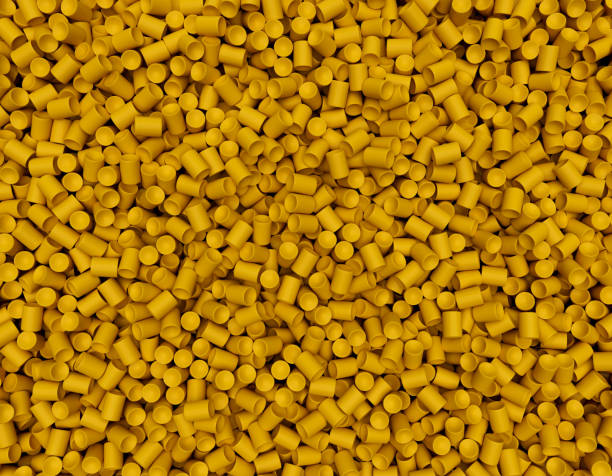 istock Yellow PVC Plastic granules Background Polymer Black plastic beads resin polymer pallet plastic resin 3d illustration 1387503997