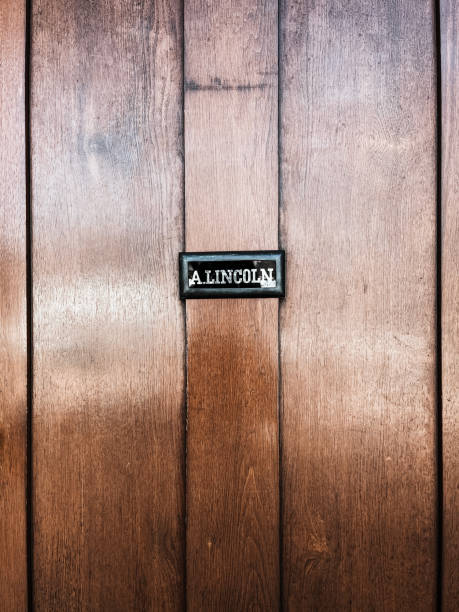 March 20, 2022 Springfield, Illinois USA: The front door to the Abraham Lincoln Home located within the Lincoln Home National Historic Site. Close-up view of the name plate placard that says, 