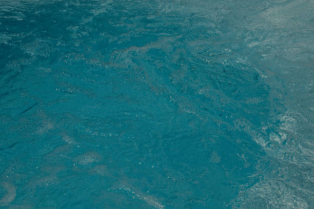 istock Blue clear fresh water in hot tub. 1387507779