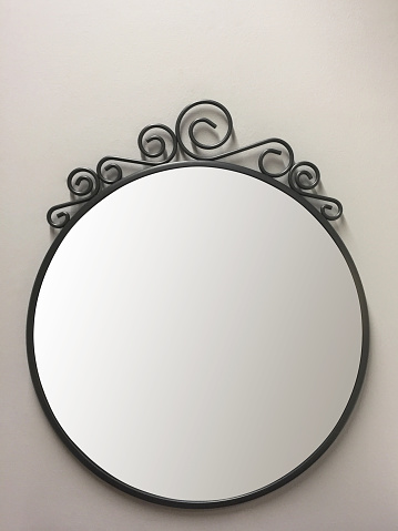 Front view mirror hanging on the wall (Frame with Clipping Path)