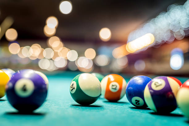 American snooker billiard balls on the pool table stock photo