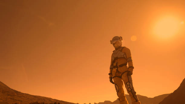 istock A walk on Mars. Female astronaut exploring rust mountains. Admiring the view 1387508832