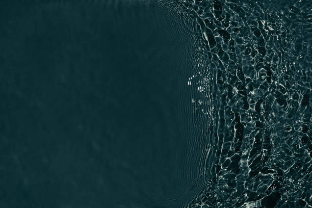 istock black transparent clear calm water surface texture 1387508888